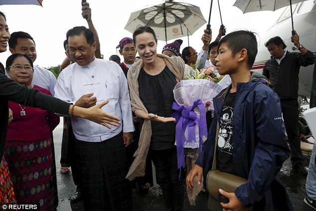 Proud mum: Angelina feels a particular affinity to south east Asia because her son, Pax, who is accompanying her, is from the region