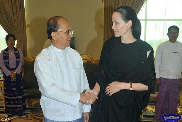 Rare meeting: Un Envoy Angelina Jolie shakes hands with the president of Myanmar, Thein Sein, at the presidential palace earlier today. She hopes to shine a light on human rights abuses and sexual violence