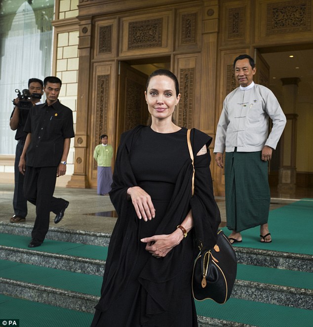 Angelina Jolie leaving the Burma Parliament building following a meeting with Speaker of the lower house, the Burmese House of Representatives, Mr Thura Shwe Mann